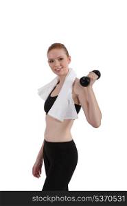 young slender sportive woman lifting dumbbell