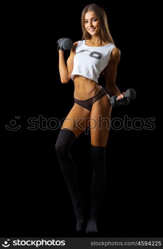 Young slim fitness girl isolated