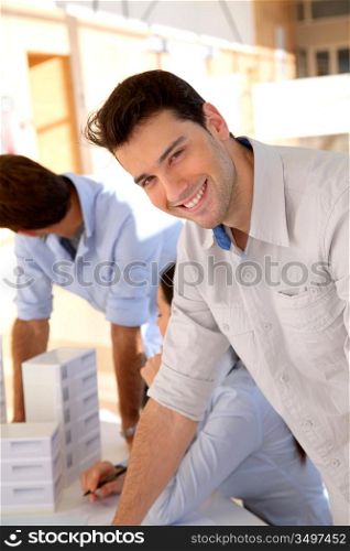 Young smiling and cheerful businessman