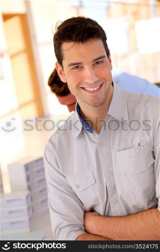 Young smiling and cheerful businessman