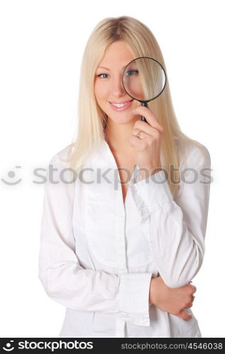 Young smiling blonde in a white shirt with a magnifying glass in hand