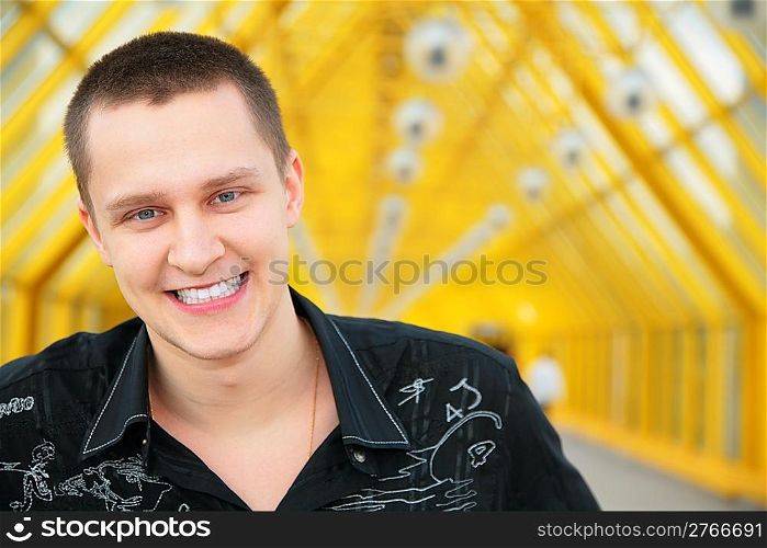 young smiling boy in black shirt