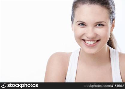 Young smiling girl on white background