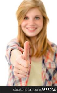 Young smiling girl showing thumbs up isolated on white background