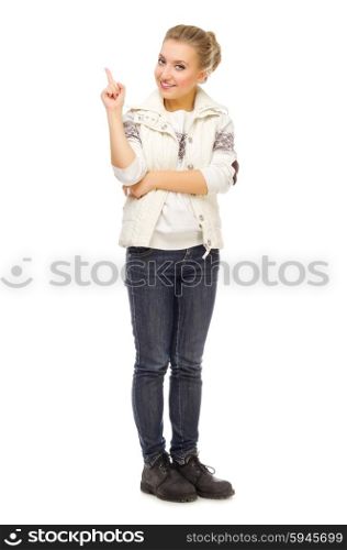 Young smiling girl shows pointing gesture isolated