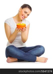 Young smiling girl with fruit salad isolated