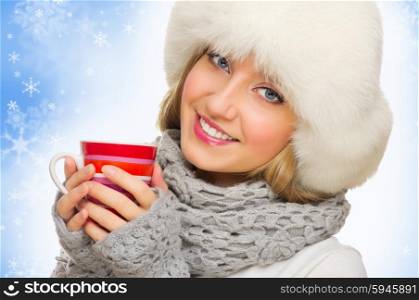 Young smiling girl with red mug isolated