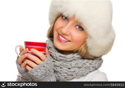 Young smiling girl with red mug isolated