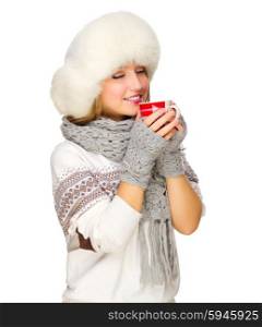 Young smiling girl with sweater and mug isolated