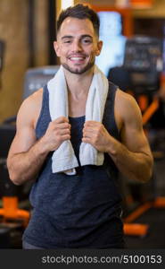 young smiling man in gym