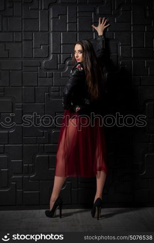 Young smiling woman fashion portrait in studio