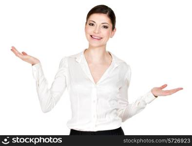Young smiling woman holds something on palm isolated on white background.