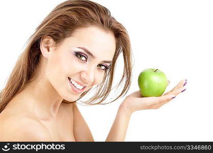 Young smiling woman offering a green apple