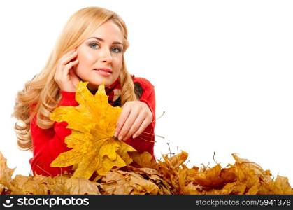 Young smiling woman with autumn leaves