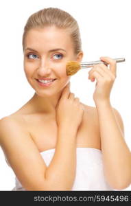 Young smiling woman with makeup brush isolated