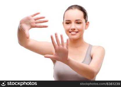 Young sports girl pressing virtual button isolated on white