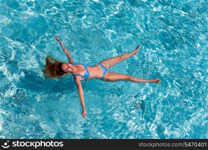 Young sports woman swims