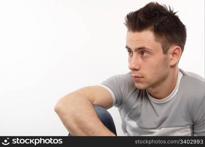 Young sportsman looking on his right side