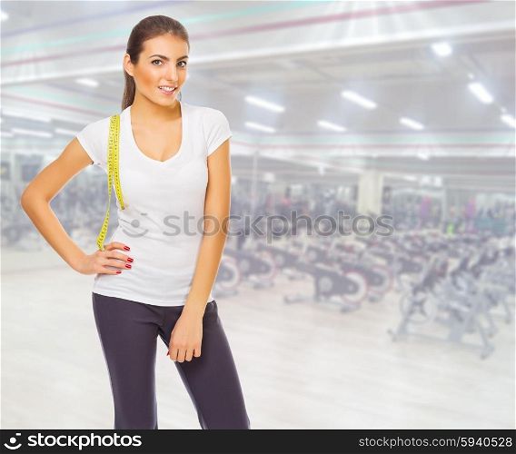 Young sporty girl at fitness club