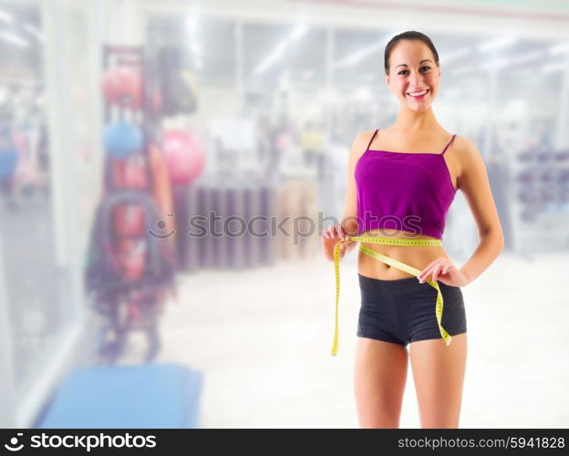 Young sporty girl at fitness club