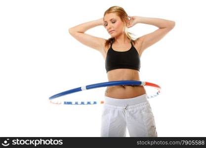 young sporty girl doing exercise with hula hoop. Fitness woman isolated on white