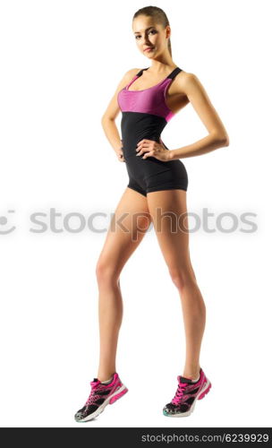 Young sporty girl doing gymnastic exercises isolated