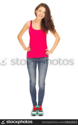 Young sporty girl in blue jeans isolated