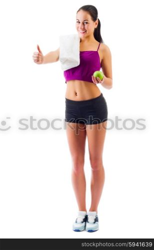 Young sporty girl with apple isolated