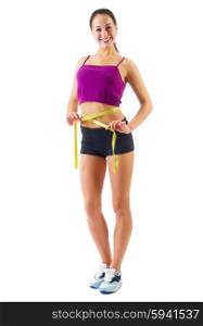 Young sporty girl with centimeter tape isolated