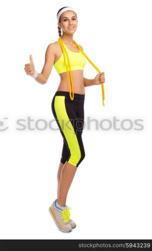 Young sporty girl with skipping rope isolated