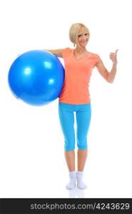 Young sporty woman does weight training with a blue ball in the gym. isolated on a white background