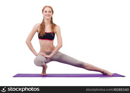 Young sporty woman doing exercises on white