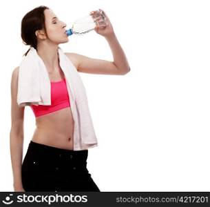 young sporty woman drinking water. young sporty woman drinking water on white background