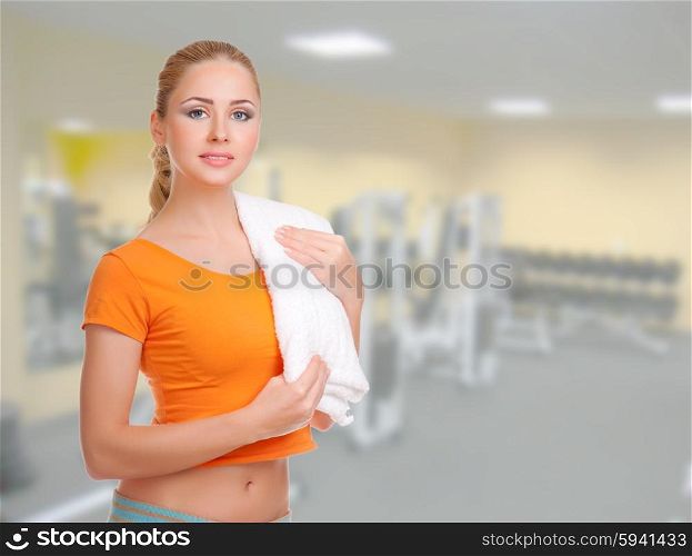 Young sporty woman on fitness club