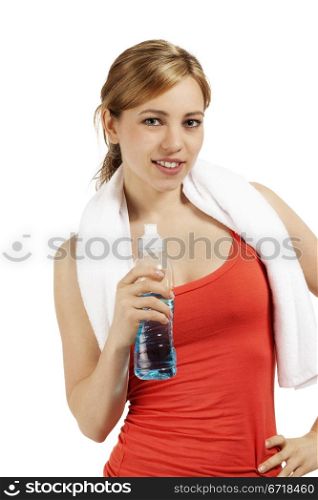 young sporty woman with a bottle of water. young smiling sporty woman with a bottle of water on white background