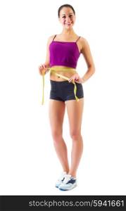 Young sporty woman with measuring tape isolated