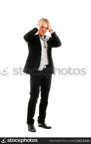 Young stressed businessman. Isolated over white.