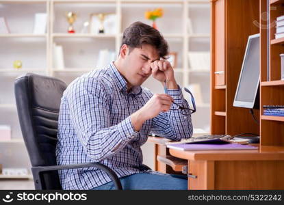 Young student at computer table