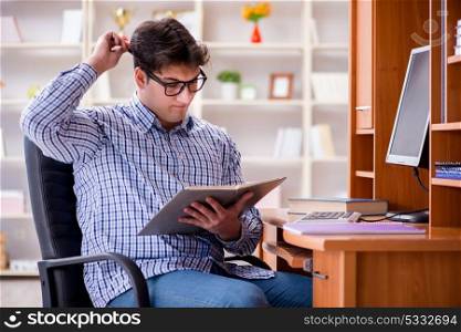 Young student at computer table