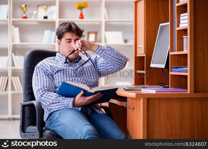 Young student at computer table