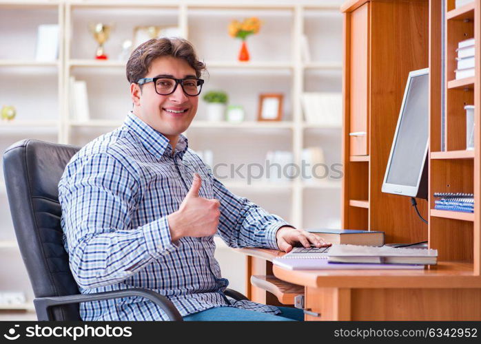 Young student at computer table