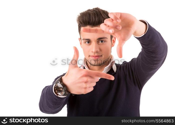 Young student boy making framing key gesture - isolated over white