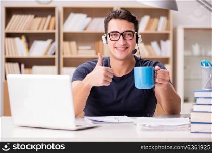 Young student drinking coffee from cup