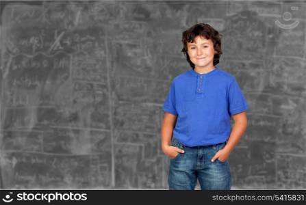 Young student in the class with a blackboard of background