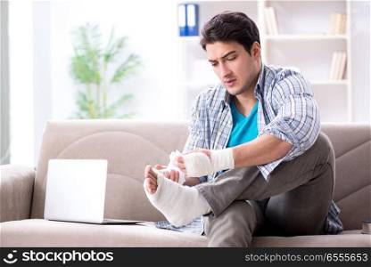Young student man with injury at home