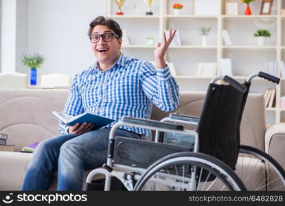 Young student on wheelchair in disability concept