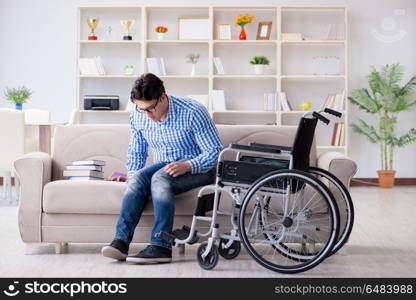 Young student on wheelchair in disability concept