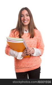 Young student posing over a white background