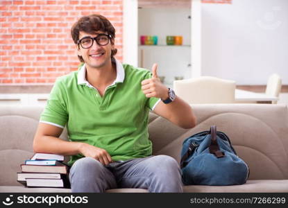 Young student preparing for exams at home 