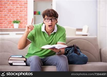 Young student preparing for exams at home 